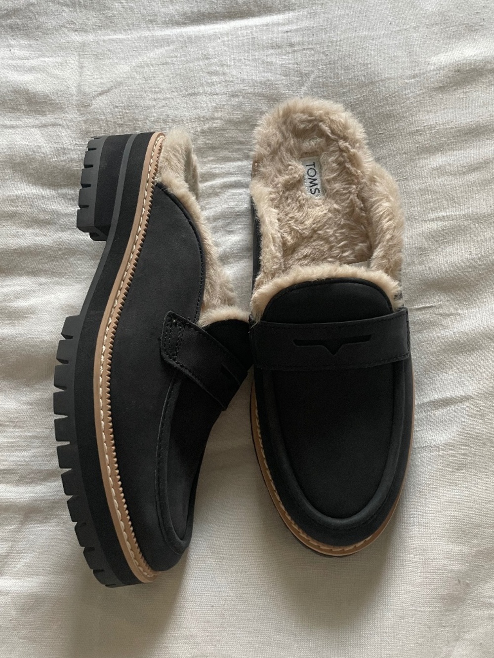TOMS black leather Cara cozy lug sole sherpa loafer chunky mule